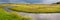 Panoramic view of an approaching storm on a marsh on the Gulf Coast