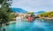 Panoramic view of Assos village in Kefalonia, Greece. Turquoise blue colored water in Mediterranean sea and beautiful