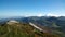 Panoramic view of autumn mountains Lovcen in Montenegro. Views of the peaks of the hills, the colorful trees and stones