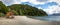 Panoramic view of Bahia Mansa Bay and Lifeguard cabin at Nahuel Huapi Lake - Villa La Angostura, Patagonia, Argentina