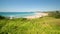 Panoramic View of a beach in Australia with People and Surfers. Bombo Beach, Australia