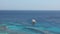 Panoramic view of beach Ras Umm El Sid. Beautiful view of Red Sea with rocky shores, sandy beach with umbrellas, white