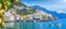 Panoramic view of beautiful Amalfi on hills leading down to coast, Campania, Italy. Amalfi coast is most popular travel and