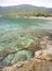 Panoramic view on beautiful beach Agios Nikolaos in Corinthian Gulf of Ionian sea in Greece on a cloudy autumn day