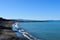 Panoramic view of the beautiful beach and seashore of Marina di Cecina, Tuscany, Italy, in the morning of a sunny summer day