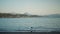 panoramic view of beautiful calm sea at wild solitary pebble beach with cliffs at coast of mediterranean sea in Turkey