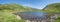 Panoramic view on Beautiful vivid blue clear mountain lake Horne Jamnicke pleso with green hill mountain peaks, Western