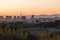 Panoramic view of Beijing from a viewpoint at sunset, on a clear day