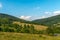 Panoramic view of the Bieszczady Mountains, sunny July day, Poland