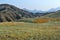 Panoramic view of blue height mountain range peaks. Beautiful Crimea landscape. Hills with dry yellow green grass
