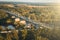 Panoramic view of bridge over river Klyazma in Vladimir city with railroad and green trees in summer day, toned