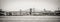 Panoramic View of Brooklyn Bridge Crossing East River. Black and White Perspective. Manhattan, New York City