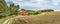 Panoramic view of building a green house near the forest. Construction of a family house. Timber construction.