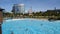 Panoramic view of Cabana Bay Hotel, Waturi Beach and people enjoying the lagoon at Volcano Bay