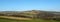 Panoramic view of the calder valley in west yorkshire with the village of midgley and dod naze surrounded by fields, woods and