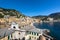 Panoramic view of Camogli, a seaside resort in northern Italy. Features colorful houses with the