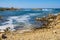 Panoramic view of Capo Figari cape rocks and seashore of Spiaggia di Cala Spada beach at the Tyrrhenian Sea coast in Golfo Aranci