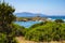 Panoramic view of Capo Figari cape rocks and seashore of Spiaggia di Cala Spada beach at the Tyrrhenian Sea coast in Golfo Aranci