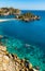 Panoramic view of Capo Taormina cape with Isola Bella island on Ionian sea shore in Messina region of Sicily in Italy
