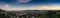Panoramic view of Caracas city at sunset from Cota Mil