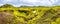 Panoramic view of cascade of small waterfalls near huge Skogarfo