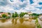 Panoramic view of castle above river in Ledec nad Sazavou. Sazava river is famous target for kayaking. Summer weather with