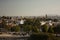 Panoramic view churches that mix between houses and buildings in the city of Puebla among trees Mexico