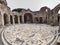 Panoramic view of the circular hall of the seven wise thermal baths in archaeological excavation of Ostia Antica, with the