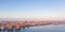 Panoramic view of the city of rostock - aerial view over the river warnow, skyline during sunrise in the morning