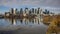 A panoramic view of a city skyline with a river in the foreground created with Generative AI