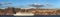 Panoramic view of the city of Thira and a cruise ship in Santorini, Geece