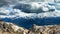 Panoramic view of the clouds over the rolling coastal mountains, BC, Canada. Mt. Blackcombe is one of the tallest peaks on the