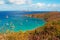 Panoramic view of Colombier beach, cactus, St Barth, sailboats