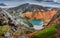 Panoramic view of colorful rhyolite volcanic mountains Landmannalaugar as pure wilderness in Iceland and a hidden highland lake,