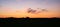 Panoramic view of colorful sky over dutch plain