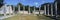 A panoramic view of columns surround grassy courtyard for ballgames at Chichen Itza, Mayan Ruins in the Yucatan Peninsula, Mexico