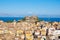 Panoramic view of Corfu old town with the Old Fortress and the Saint Spyridon Church in the distance. Corfu, Greece.