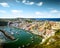 Panoramic view of Corricella village on Procida island, Italy