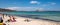 Panoramic view of Costa Smeralda coast of Tyrrhenian Sea and Isola Tavolara island seen from cala dâ€™Ambra beach in San Teodoro