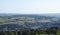 Panoramic view of the countryside around sowerby bridge in west yorkshire with buildings of the town surrounded by farms and