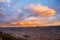 Panoramic view of Cusco town with glowing cloudscape and colorful sky at dusk. Cusco is among the most important travel destinatio