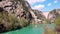 Panoramic view of dam habitat and river with emerald azure water. Beautiful artificial reservoir Green Canyon, forest