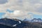 Panoramic view of the Dolomites Alps Mountains in Italy with ski slopes in spring