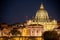 Panoramic View of the Dome of the Basilic of Saint Peter in Rome beside the Bridge on the Tevere River in Rome at Sunset
