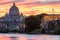 Panoramic View of the Dome of the Basilic of Saint Peter in Rome beside the Bridge on the Tevere River in Rome at Sunset