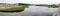 Panoramic view downstream the Lima River, south of the medieval bridge, Ponte de Lima, Portugal