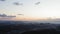 A panoramic view from a drone of the city of Vladivostok at sunset in the fall