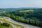 Panoramic view of Dwight D. Eisenhower highway 70 road near small Bentleyville town hills the farm meadow in