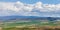 A panoramic view of Ellensburg, WA with a thunderstorm in the distance