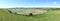 Panoramic view of the estuary of the river Cuckmere at Cuckmere Haven showing the iconic meandering S shaped river bend.